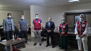 Kılıç, afet deposu ve aşevi projelerini Turunç'a taşıdı 